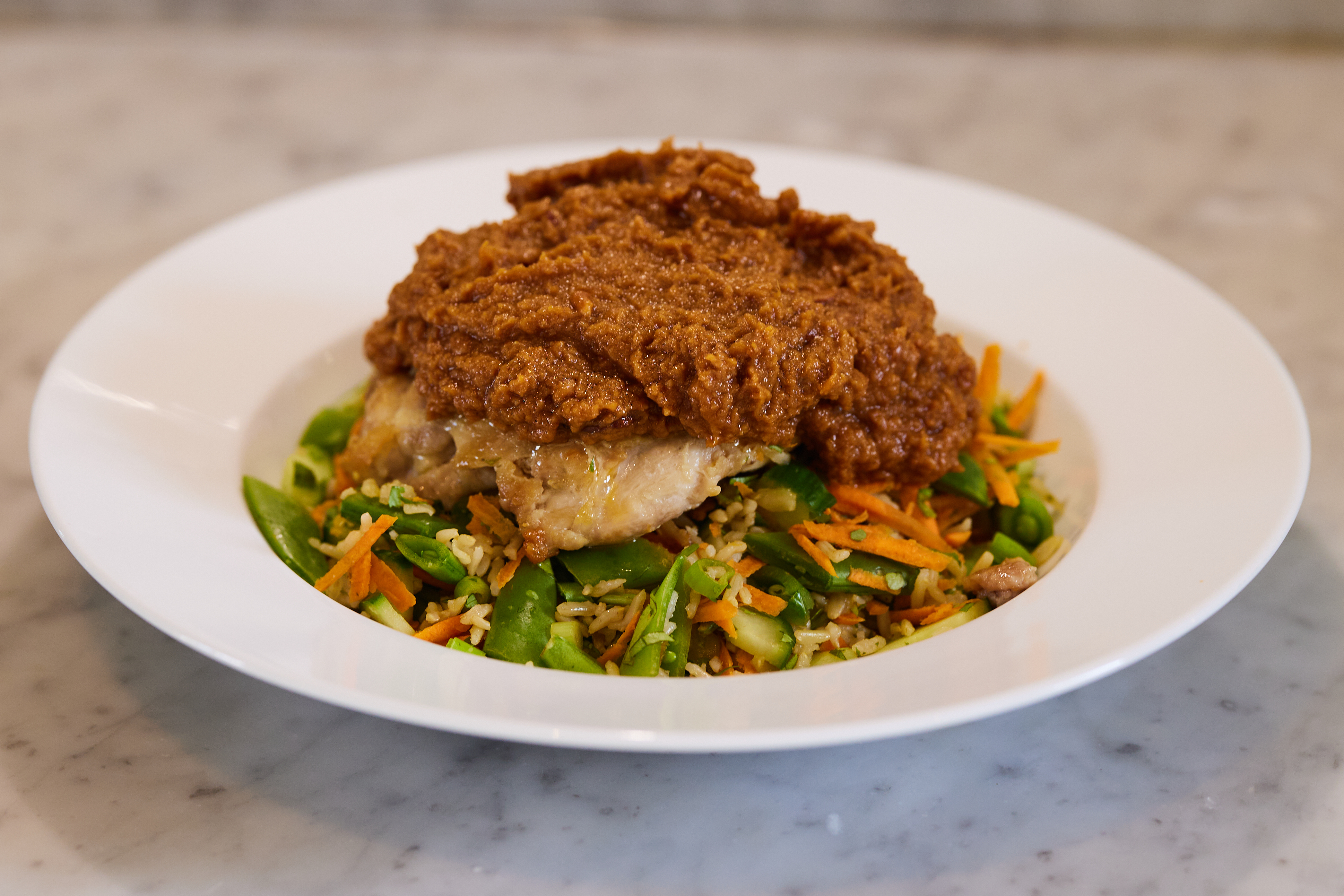 Chicken and rice salad with satay sauce